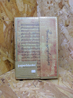 картинка Записная книжка Paperblanks Mozart, The Hunt (в линейку), Midi (13х18см), бежевая от магазина Молескинов